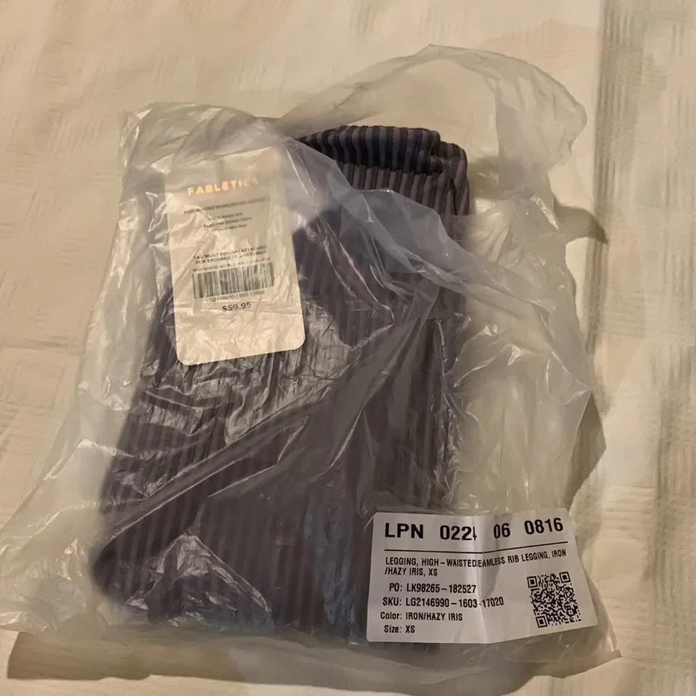 Fabletics High waisted seamless ribbon leggings. Color is hazy iris